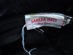 black patent hat label